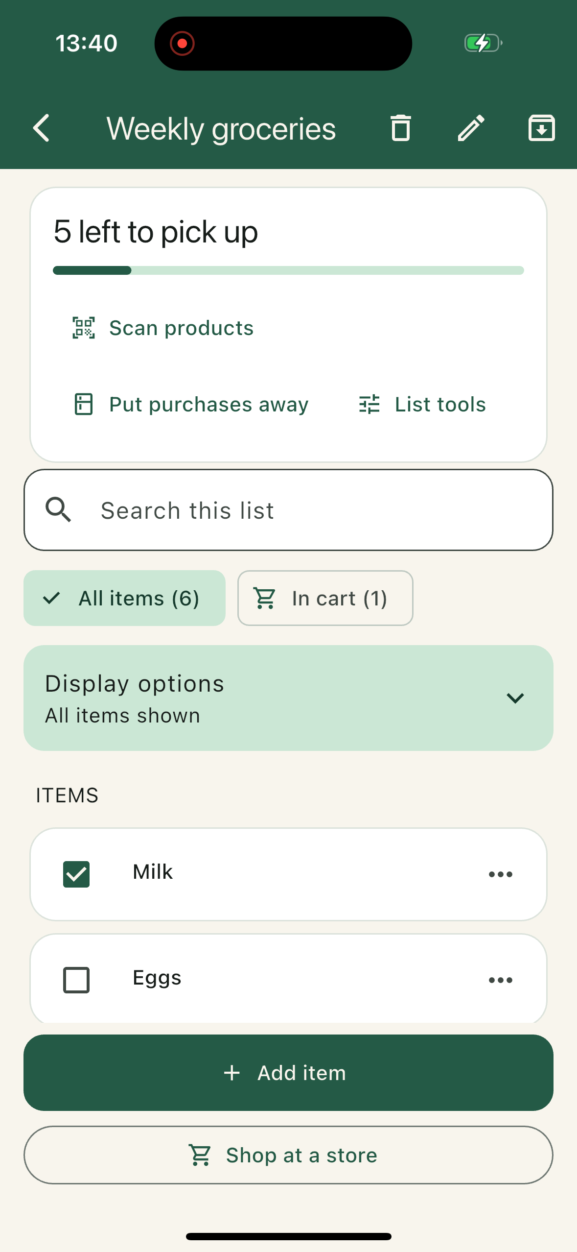Cartwoven grocery list with aisle groups, checked cart items and the Shop at a store button